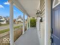 Spacious porch featuring classic columns and providing a serene outdoor space at 921 S State Ave, Indianapolis, IN 46203