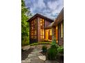 Modern home with large windows offering natural light and a view of the surrounding greenery at 9387 Sullivan Pl, Zionsville, IN 46077