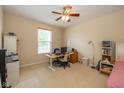 Comfortable bedroom with neutral walls, carpet, and ceiling fan at 14018 Powder Dr, Carmel, IN 46033