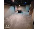 Spacious basement with exposed ceiling, perfect for recreation or additional living space at 9879 Brightwater Dr, Fishers, IN 46038
