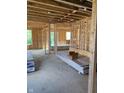 Unfinished interior showing the wood frame and layout of the main living space at 1041 Fuller Ln, Shelbyville, IN 46176