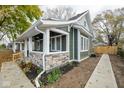 Side view of home with clean landscaping, showcasing its well-maintained exterior at 1921 N Dexter St, Indianapolis, IN 46202