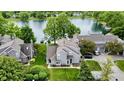 Lovely two-story home with backyard lake view offering serene living in a well-manicured neighborhood at 2829 Somerset Bay, Indianapolis, IN 46240