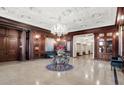 Elegant lobby with a chandelier, decorative ceilings, and wood-paneled walls at 350 N Meridian N St # 701, Indianapolis, IN 46204