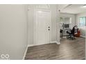 Bright office space with hardwood floors, natural light, and neutral paint at 11199 Boston Way, Fishers, IN 46038