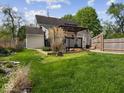 Spacious backyard featuring a charming gazebo and well-maintained lawn at 116 E Railroad St, Fountaintown, IN 46130