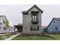 Charming craftsman-style home featuring board and batten siding and a small balcony at 17346 Newton Main St, Westfield, IN 46074