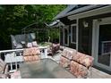 Relaxing back deck with outdoor seating, perfect for entertaining guests and enjoying the tranquil setting at 455 E Main St, Danville, IN 46122