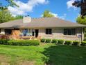 This property boasts a well-manicured lawn, complemented by a charming wood deck at 5361 Carnoustie Cir, Avon, IN 46123