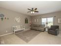 Inviting living room with neutral tones, comfortable seating, and ample natural light at 7140 Lakeland Trails Blvd, Indianapolis, IN 46259