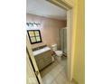 Bathroom showcasing new vanity with solid countertops, tile backsplash, and glass shower at 1639 Park Castle Way, Indianapolis, IN 46229