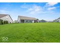 Expansive green backyard, perfect for outdoor activities and relaxation at 16739 Cattle Hollow Ln, Noblesville, IN 46060