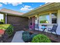 Inviting front porch with seating and a 'Welcome' sign at 2769 S 800 W, Indianapolis, IN 46239