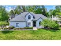 Beautifully landscaped front yard featuring a two-story home with a well-maintained lawn at 3162 Hazel Foster Dr, Carmel, IN 46033