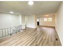 Spacious living room area with hardwood floors and neutral color palette at 3640 Breen Dr, Indianapolis, IN 46235