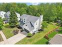 Aerial view of a two-story home with lush greenery and a spacious backyard at 7388 Wythe Dr, Noblesville, IN 46062