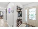 Well-organized entryway with a built-in bench, coat rack, and stylish decor for a welcoming first impression at 745 N Madison St, Fortville, IN 46040