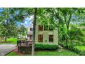 Charming home with a large deck nestled in a serene, green setting at 1530 E 75Th St, Indianapolis, IN 46240