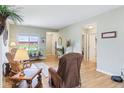 Comfortable living room with hardwood floors and abundant natural light at 217 Devonshire Ct, Anderson, IN 46013