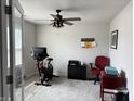 Bright and airy home office with a ceiling fan and neutral decor at 230 Kiawah Dr, Whiteland, IN 46184