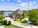 An inviting home featuring a three-car garage and beautiful landscaping at 3107 Waterfront Cir, Anderson, IN 46012