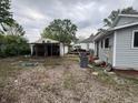 View of the backyard and shed, showing potential for outdoor living and storage at 350 Johnson Ave, Franklin, IN 46131
