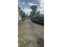 Gravel driveway offering convenient parking and access to the property at 350 Johnson Ave, Franklin, IN 46131