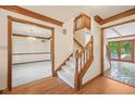 The spacious hallway leads to other rooms, showcasing the home's open layout and staircase at 101 Applecross Dr, Brownsburg, IN 46112