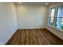 Empty room with recessed lights and vinyl floor plus a large window for ample light and scenic viewing at 1679 W 171St St, Westfield, IN 46074