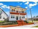 Beautiful two-story duplex with a shared porch and a modern design at 2013 Yandes St, Indianapolis, IN 46202