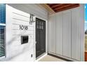 Close-up of the front door at 1018, showcasing the classic black door with a white frame at 2013 Yandes St, Indianapolis, IN 46202
