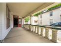 View of the porch with detailed columns, offering a relaxing outdoor space at 207 S Center St, Plainfield, IN 46168