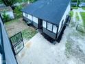Aerial view of the home with fenced yard and easy access at 2435 Asbury St, Indianapolis, IN 46203