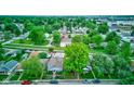 Scenic aerial view of charming neighborhood, showcasing lush greenery and well-maintained homes at 4956 W 11Th St, Speedway, IN 46224