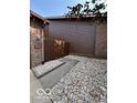 Charming exterior featuring stone accents and a well-maintained walkway surrounded by decorative rocks at 209 Brighton Ct, Greenwood, IN 46143
