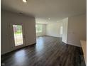 Spacious living room featuring modern flooring, recessed lighting, and a bright, airy feel at 2143 Warbler St, Danville, IN 46122
