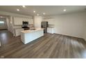 Bright, modern kitchen with stainless steel appliances, a center island, and lots of storage at 2159 Warbler St, Danville, IN 46122