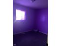 Picture of a bedroom that has damaged walls and carpeting at 2609 Mars Hill St, Indianapolis, IN 46241
