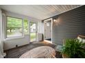 Inviting front porch with stylish decor, offering a cozy and welcoming entrance to the home at 3019 W Huntsville Rd, Pendleton, IN 46064