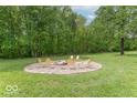 Outdoor area with firepit and chairs in a secluded yard at 1409 S Northview Dr, Martinsville, IN 46151