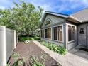 Beautiful home with a well-maintained yard, a cozy sunroom, and a charming stone facade at 16657 Brownstone Ct, Westfield, IN 46074