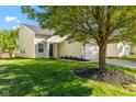 Charming single-Gathering home featuring a well-manicured lawn at 3119 Earlswood Ln, Indianapolis, IN 46217