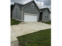 Well-maintained home with a two-car garage and concrete driveway at 336 W 29Th St, Indianapolis, IN 46208
