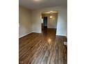 The living room has beautiful wood flooring and neutral paint, offering a welcoming atmosphere at 41 S Warman Ave, Indianapolis, IN 46222