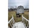 View of backyard featuring a shed and space for outdoor activities at 6209 Meadowlark Dr, Indianapolis, IN 46226