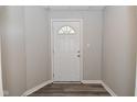 Entryway featuring a storm door and neutral wall color at 623 Orange St, Indianapolis, IN 46203