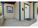 Cozy covered front porch with view of the front yard at 623 Orange St, Indianapolis, IN 46203
