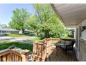 Outdoor porch view with patio furniture set and view of the grassy neighborhood at 7849 E 49Th St, Indianapolis, IN 46226