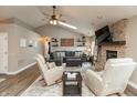 Cozy living room with fireplace, plush seating, and stylish decor, perfect for relaxation at 35 Valley View, Brownsburg, IN 46112