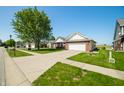 Attractive single-Gathering home with a well-kept lawn and a view of the surrounding neighborhood at 40 Clear Spring Ln, Trafalgar, IN 46181
